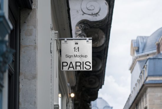 Sign mockup hanging on a Paris street, clear view for designers to showcase branding, suitable for mockups category.
